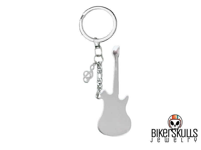 La melodia della tua vita, sempre con te.
Questo portachiavi in acciaio inossidabile color argento è un omaggio alla tua passione per la musica. La piccola chiave di sol, simbolo universale della melodia, ti ricorda che la musica è parte integrante della tua vita. La chitarra, grande e imponente, è un'icona di libertà e di espressione creativa.