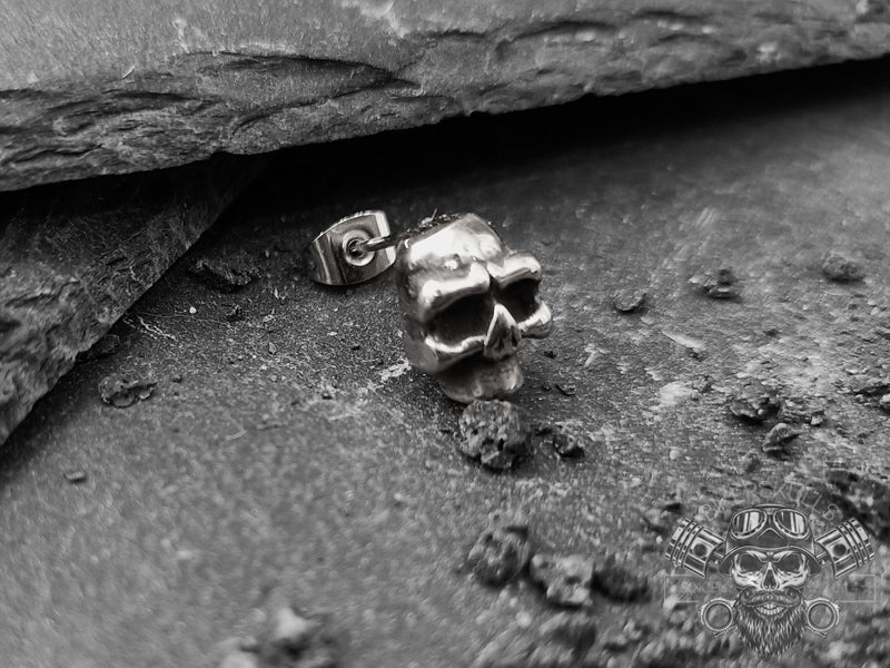 Mono orecchino Dorsey teschio in acciaio lucido