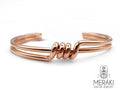 Bracciale rigido intreccio spinato in acciaio rosato