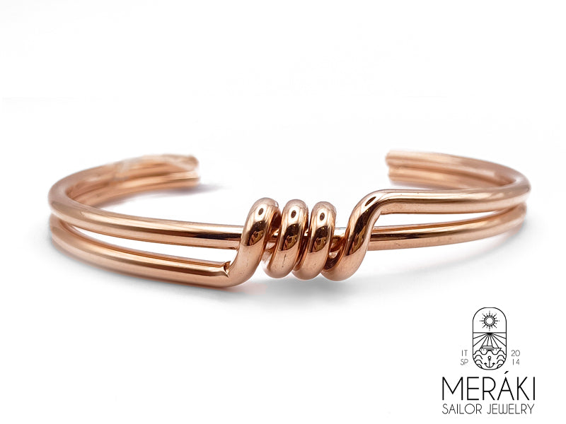 Bracciale rigido intreccio spinato in acciaio rosato