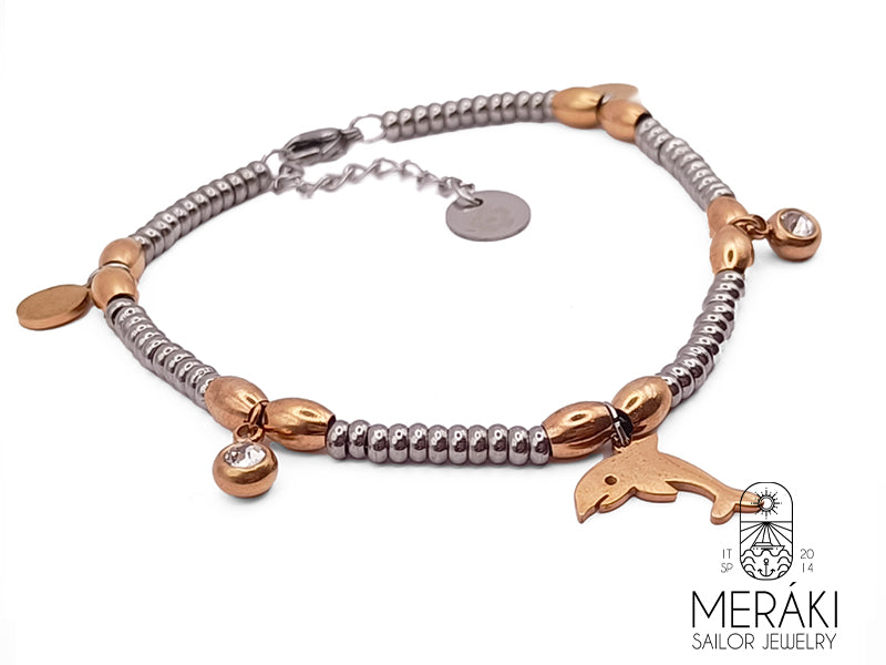 Bracciale con ciondoli pendenti con struttura a rondelle infilate in una robusta catena rolò in acciaio