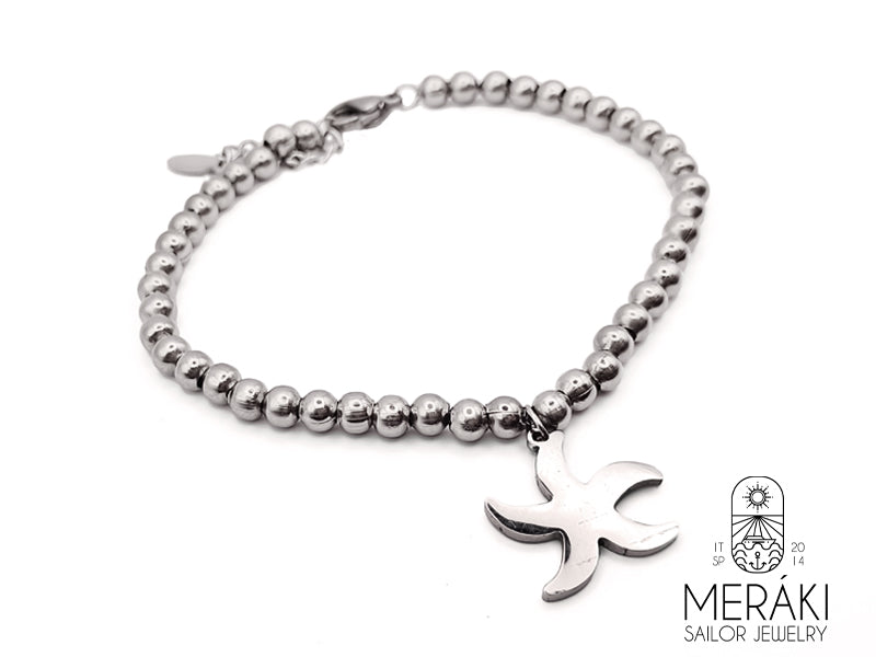 Bracciale Starfish in acciaio con stella marina “Luce che brilli in fondo al mare, regina del mondo sommerso che illumini l’oceano. Portami fortuna e proteggi fino a destinazione chi naviga con te.” Bracciale da donna marinaro, realizzato con catena a maglia fine e perline da 4 mm 