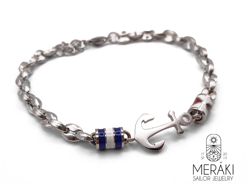Guida il tuo stile nella giusta direzione con questo bracciale con ancora & timone in acciaio.