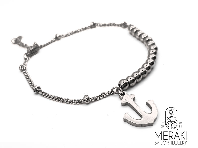  bracciale realizzato completamente in acciaio con pendete raffigurante un Ancora