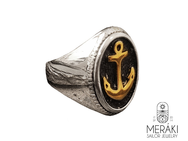 Anello Brishon in acciaio inox lucido con ancora dorata