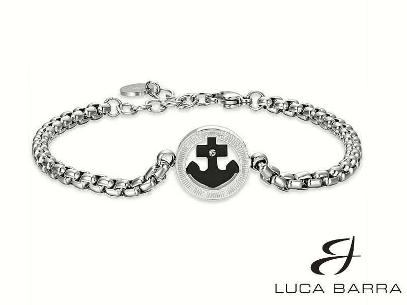 Indossa l'Eleganza e Forza con il Bracciale Uomo in Acciaio con Ancora IP Nero e Cristallo Bianco. Un accessorio che unisce simbolismo e stile moderno, perfetto per esprimere la tua determinazione e la tua eleganza in modo audace e distintivo.