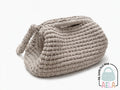 Borsa clutch handmade in cotone riciclato, lavorazione artigianale con dettagli curati.