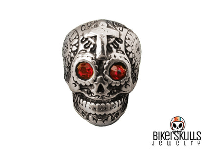 Anello Biker Skulls in acciaio rappresentante un teschio messicano con croce e zirconi rossi