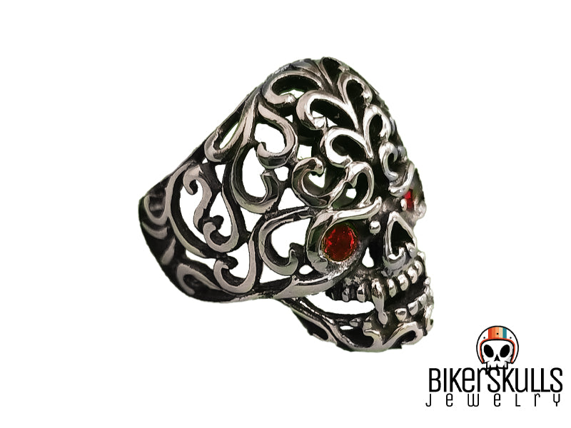 Anello teschio messicano in acciaio 316L con zirconi rossi
