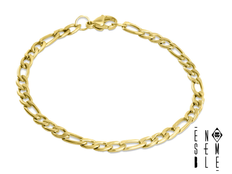 Mostra il tuo stile con questo bracciale massiccio! La catena Figaro da 9 mm in acciaio inossidabile con finitura oro è un vero statement. Robusto, elegante e perfetto per l'uso quotidiano, questo bracciale è un accessorio che non ti stancherai mai di indossare. Un tocco di lusso accessibile, per un look sempre impeccabile.