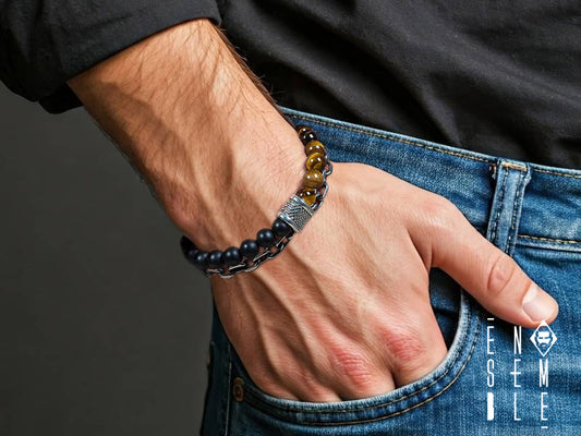 Un mix esplosivo di energia e stile! Questo bracciale multifilo combina la forza dell'occhio di tigre, l'eleganza misteriosa dell'onice nera e il tocco moderno della catena a maglia. Un accessorio che ti farà sentire invincibile e alla moda.