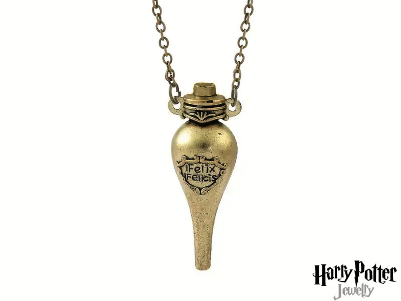 Questa collana è realizzata in metallo nickel free, ideale per pelli sensibili. Il ciondolo è una fialetta in vetro trasparente, sigillata con cura, con la scritta 'Felix Felicis' elegantemente impressa. Un accessorio di alta qualità, perfetto per gli appassionati e per chi cerca un simbolo di buona fortuna