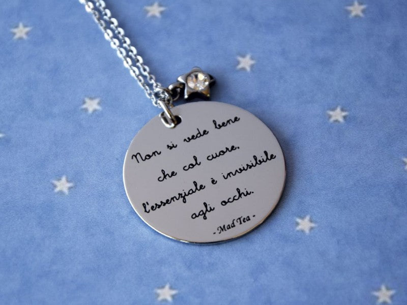 Mad tea stainlees steel necklace with text of le petit prince
