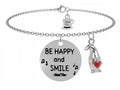 "Sorridi, la felicità parte sempre da te!" Questo bracciale è ispirato ai Sette Nani di Biancaneve che con il loro umore sempre allegro affrontano anche le più dure giornate di lavoro con sorrisi ed allegria. Indossando questo bracciale porterai con te sempre la felicità di un sorriso! Bracciale con un nanetto di Biancaneve che abbraccia il cuore rosso simbolo della felicità e targhetta con incisa la frase "Be happy and smile" ossia "Sii felice e sorridi".
