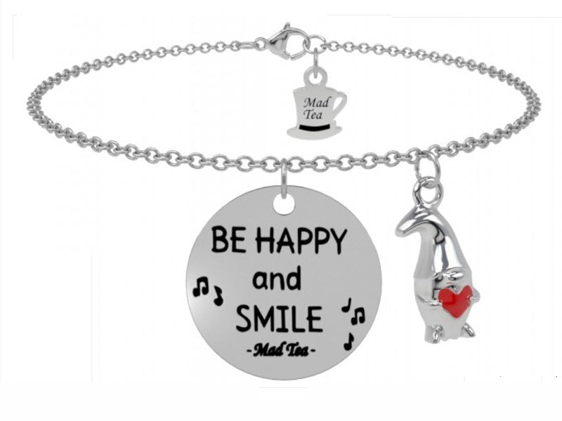 "Sorridi, la felicità parte sempre da te!" Questo bracciale è ispirato ai Sette Nani di Biancaneve che con il loro umore sempre allegro affrontano anche le più dure giornate di lavoro con sorrisi ed allegria. Indossando questo bracciale porterai con te sempre la felicità di un sorriso! Bracciale con un nanetto di Biancaneve che abbraccia il cuore rosso simbolo della felicità e targhetta con incisa la frase "Be happy and smile" ossia "Sii felice e sorridi".