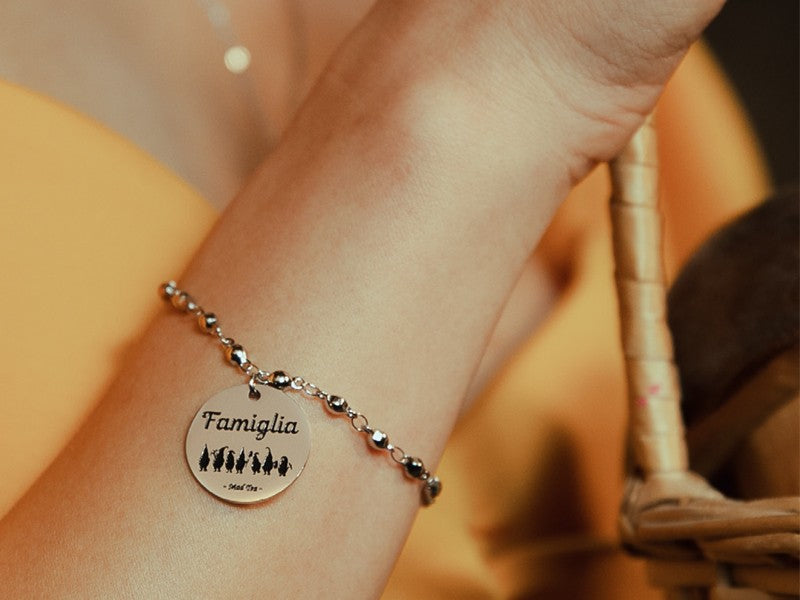 Bracciale "Famiglia" in acciaio anallergico con ciondolo dei sette nani e scritta famiglia