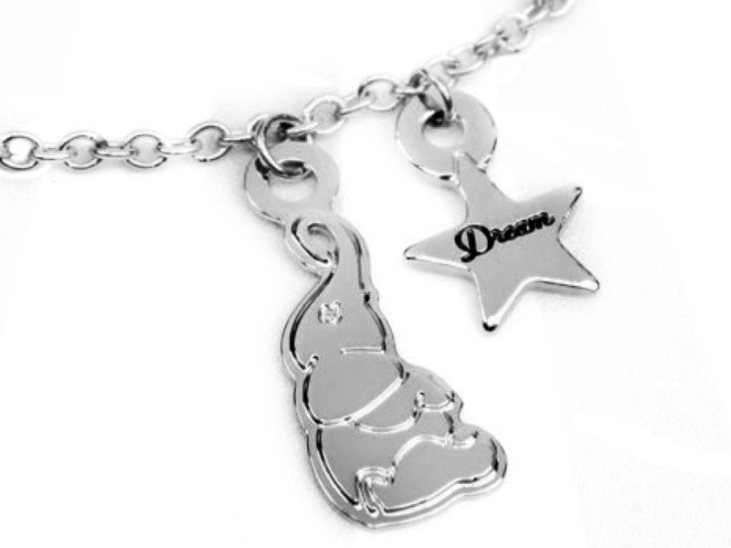 Dettaglio ciondoli bracciale Dream it possible in acciaio 