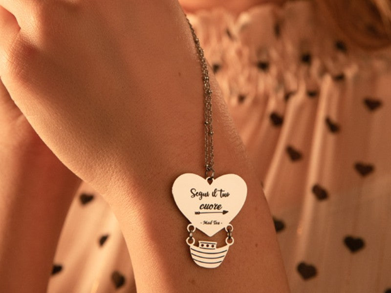 Collana il dirigibile dei sogni in acciaio con cuore inciso Segui i tuoi sogni