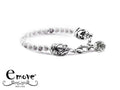 Il bracciale EMOVE BRQ 1070 Aulite composto da scultura metallica in microfusione a forma di cuore con doppio bagno d’argento e pietre naturali appartiene alla linea AMORE.