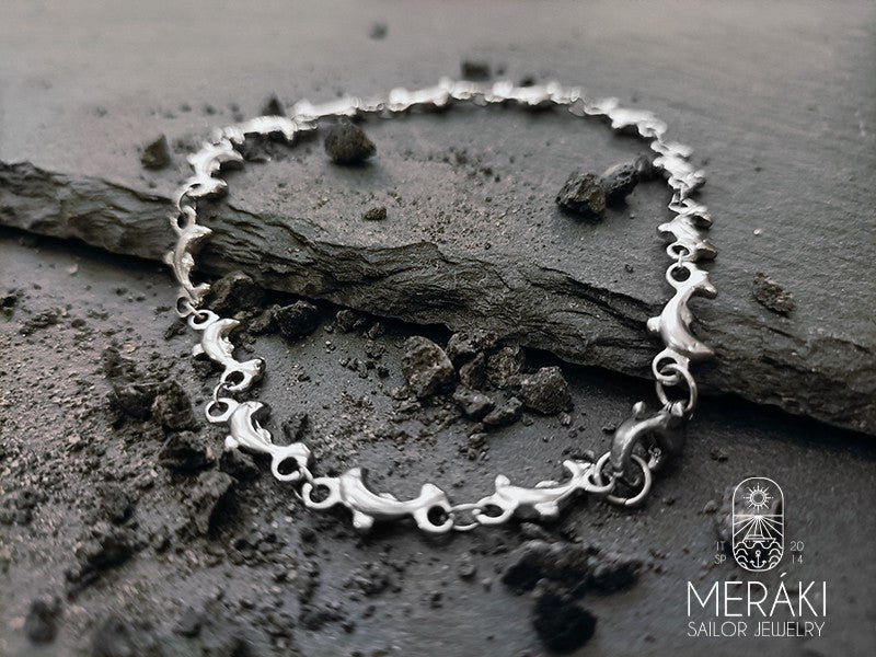 Bracciale in acciaio con catena di delfini