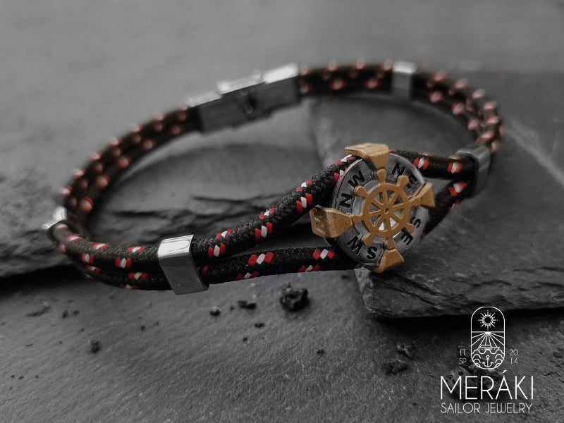 Bracciale Itziar con timone dorato e punti cardinali