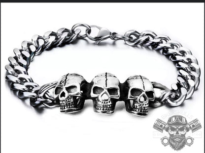 Math bracelet with three steel skulls 