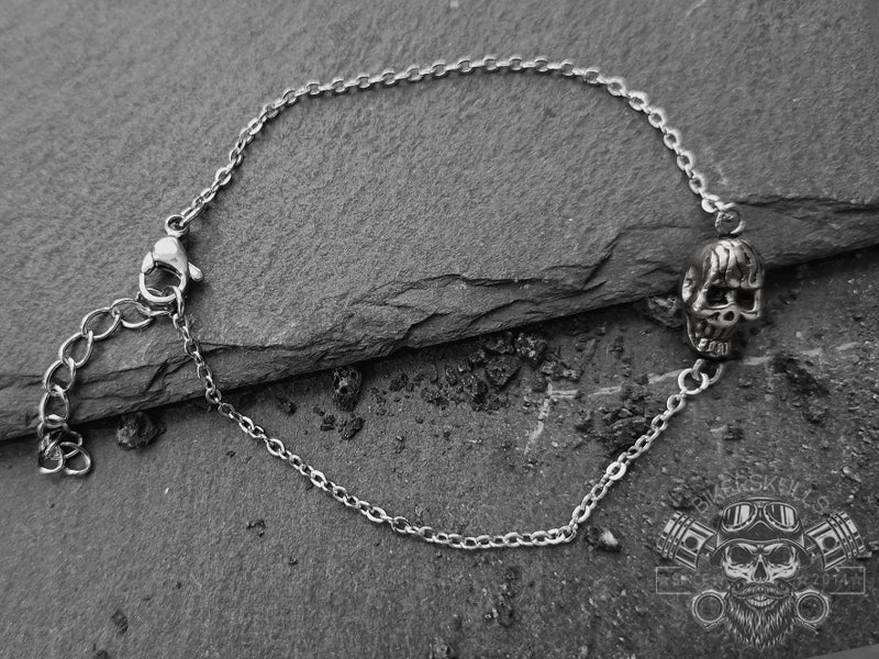 Bracciale Kirin con teschio fiammeggiante in acciaio