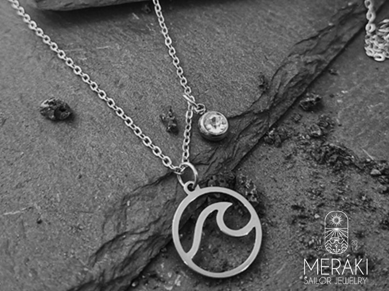 Collana da donna Big Wave in acciaio con onda e punto luce