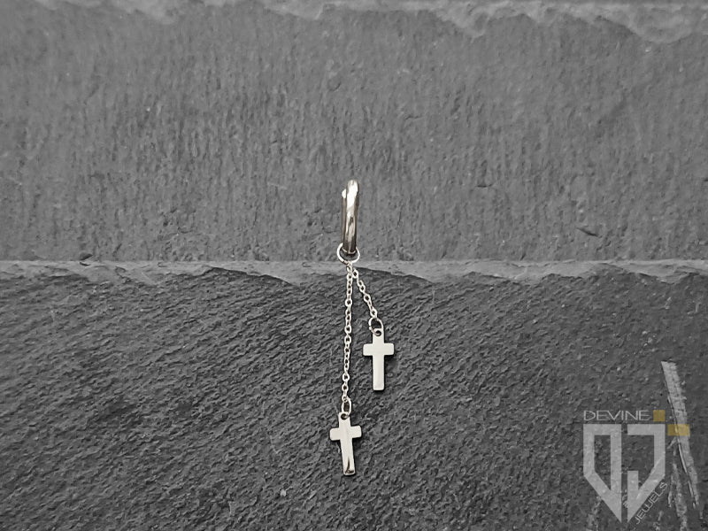 Mono orecchino a cerchio con croci pendenti in acciaio dorato