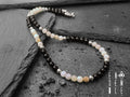 Collana in acciaio con pietre Agata nere e bianche da 6 mm, alternate ad elementi di acciaio 