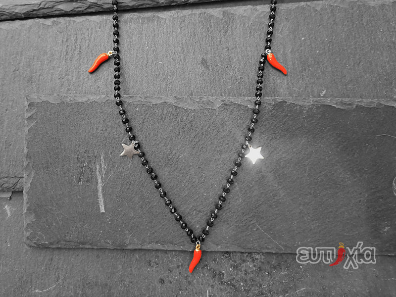 Collana Amelie cristalli neri, cornetti rossi e stelle in acciaio