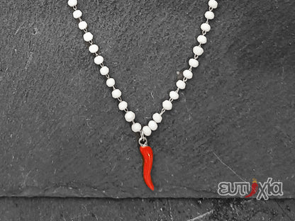 Collana Blair cristalli bianchi con cornetto rosso in acciaio