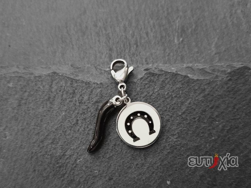 Ciondolo Enam ferro di cavallo e cornetto nero in acciaio