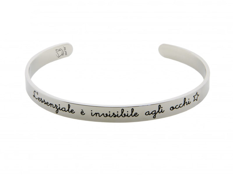 Bracciale rigido con incisa la frase "L'essenziale è invisibile agli occhi" ispirata al Piccolo Principe.  Misura: 6,4 cm di diametro regolabile