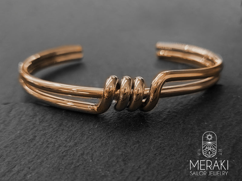 Bracciale rigido intreccio spinato in acciaio rosato