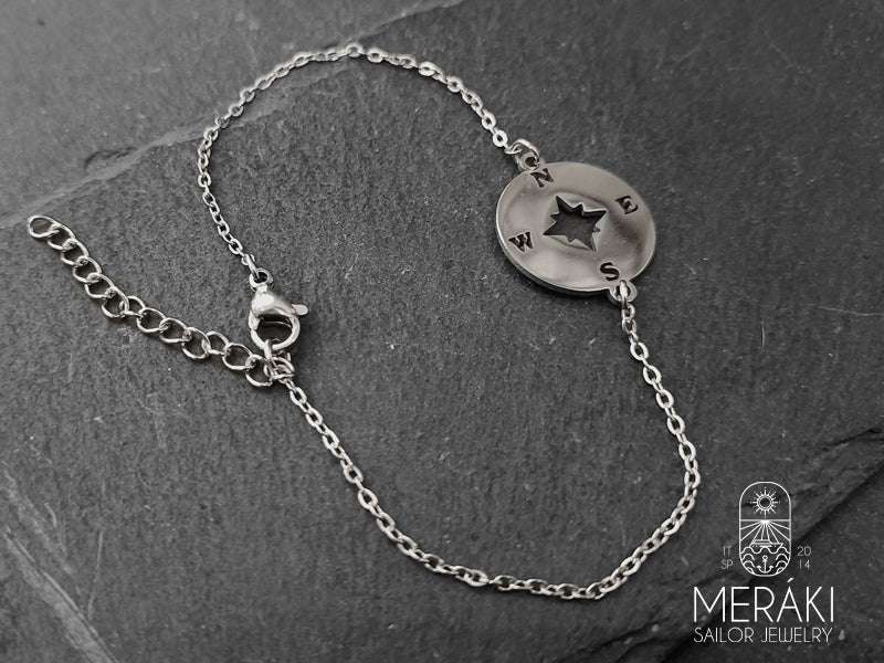 Bracciale in acciaio con rosa dei venti e punti cardinali centrale