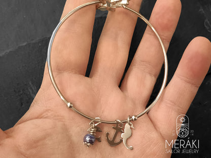 Bracciale Ocean world bangle rigido con ciondoli marinari