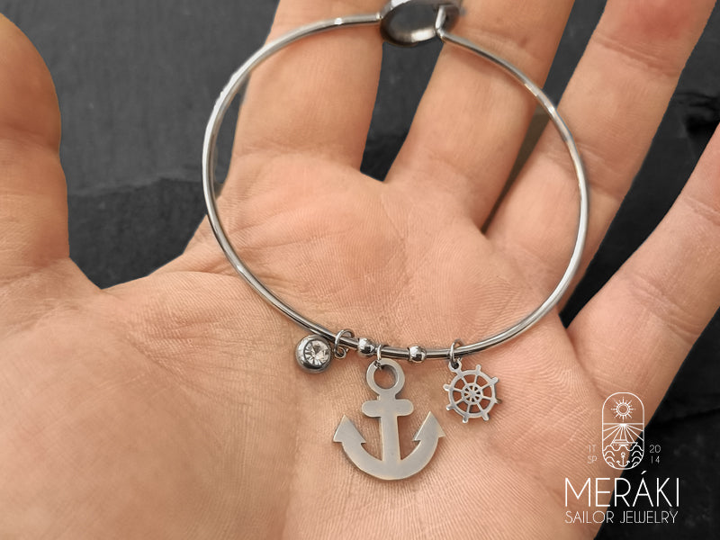 Bracciale rigido da donna con ancora e timone in acciaio