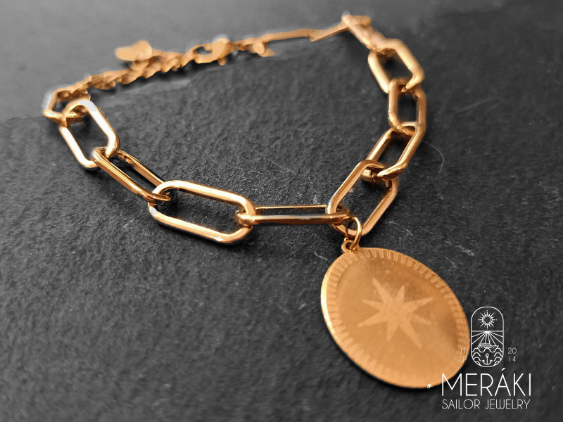 Bracciale catena in acciaio rosato con piastrina rosa dei venti