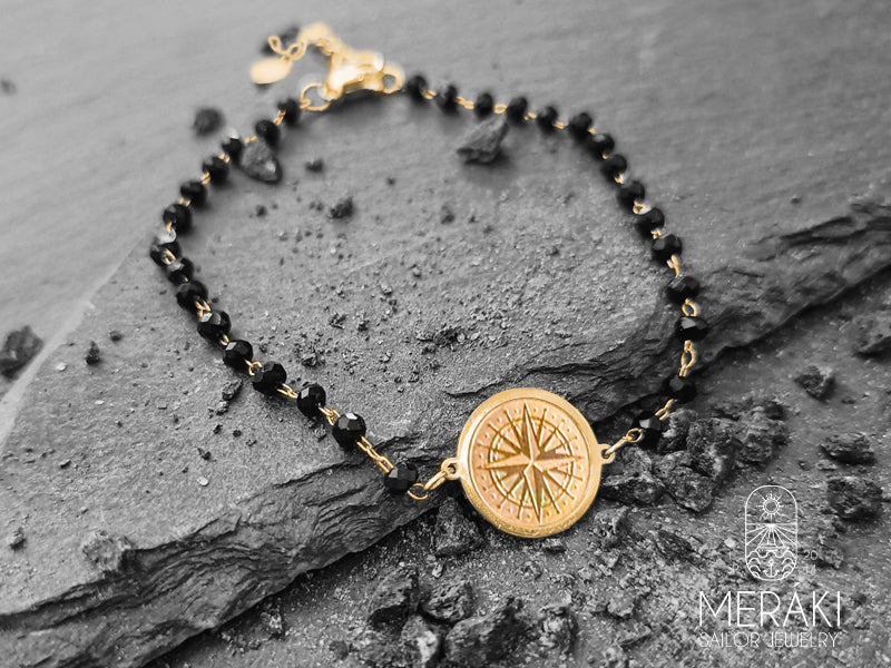 Rdv bracelet with black beads and wind rose 