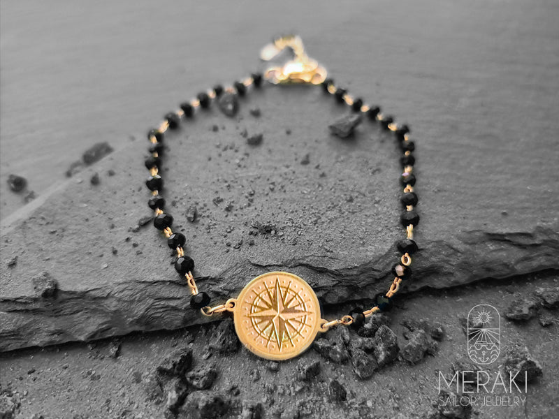 Rdv bracelet with black beads and wind rose 