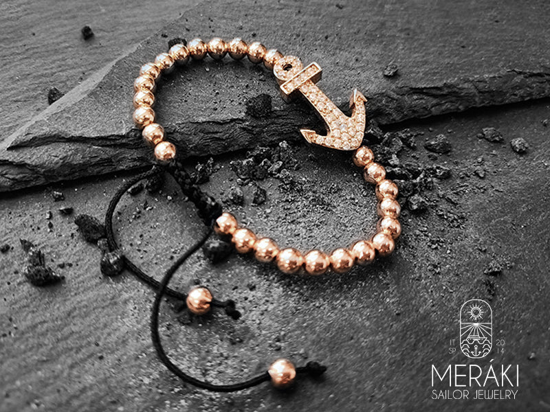 Bracciale in cortdino cerato nero e perline, ancora in acciaio rosato